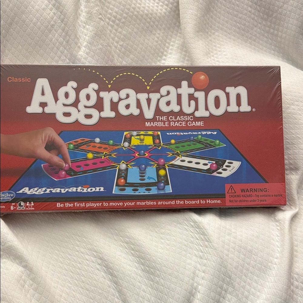 Hasbro Aggravation Game with Colorful Board. Brand New Factory Sealed box